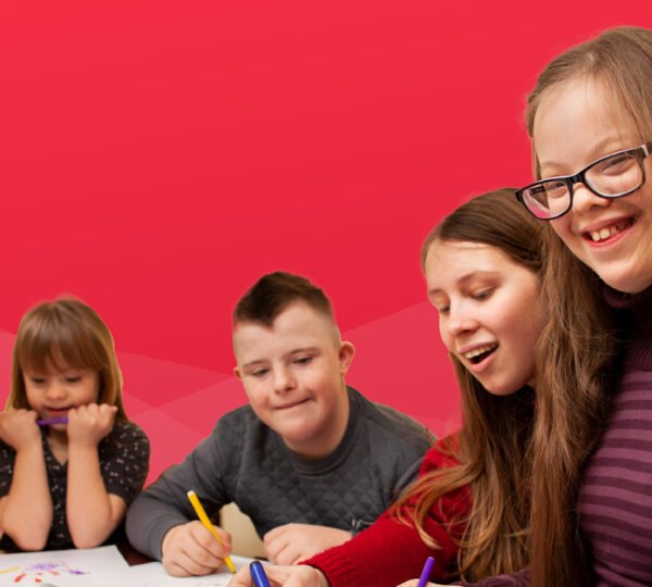 Students sitting around table.